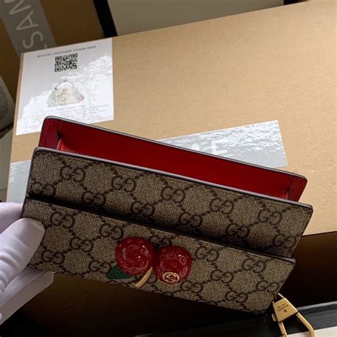 gucci cherry wallet white|Gucci wearable wallet.